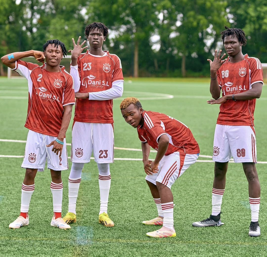 FC Super Sport players posing together on the pitch